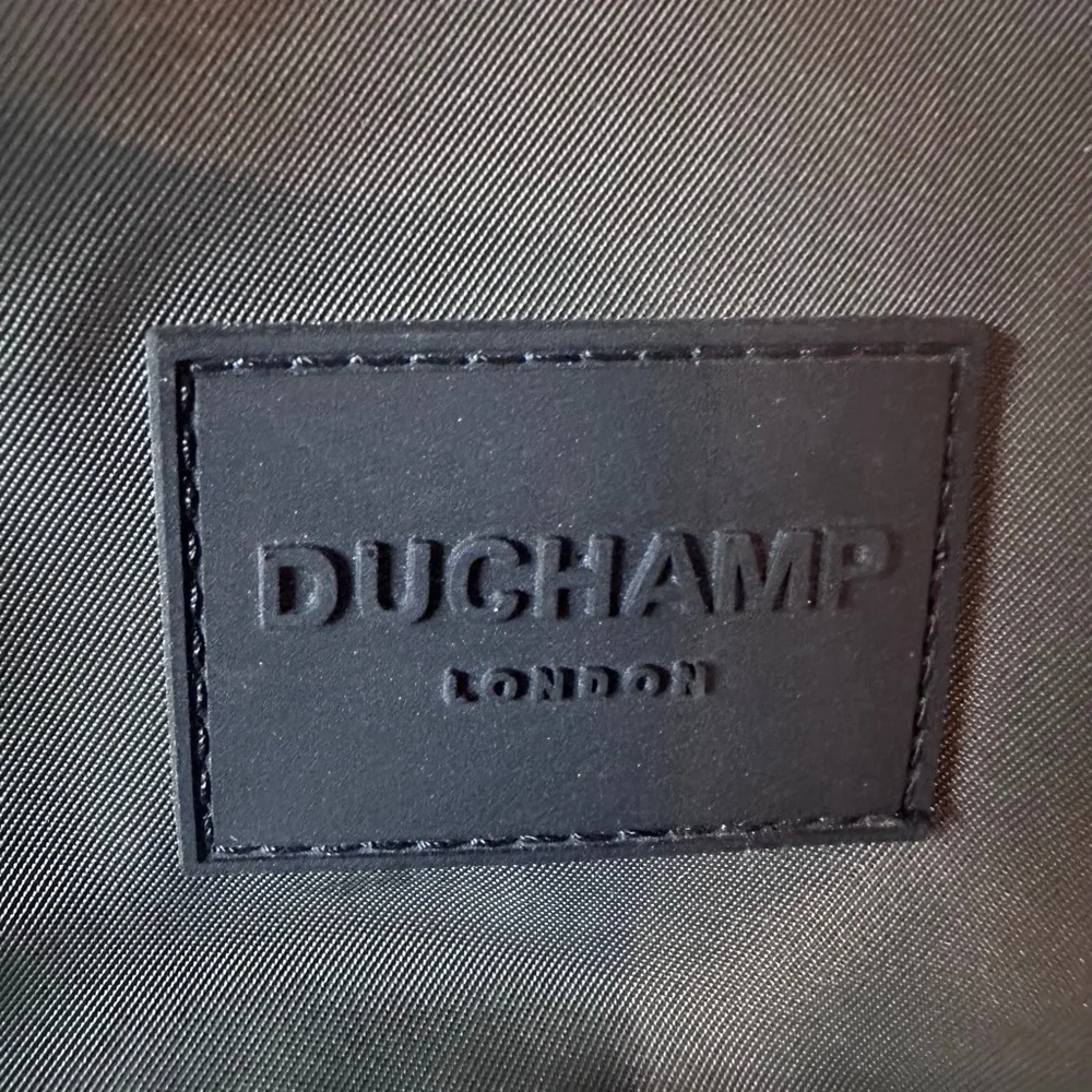 NWOT DUCHAMP Sling Green Backpack Crossbody Bag Water Resistant Zippered 13.5
